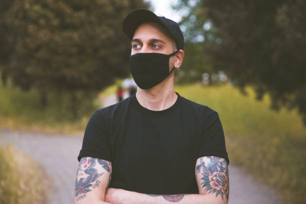 Young Men With Mask Outdoors Young Men With Black Mask Outdoors
Customizable Mask and T-shirt blank t shirt stock pictures, royalty-free photos & images