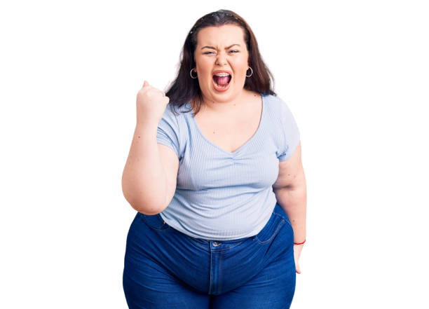 young-plus-size-woman-wearing-casual-clothes-angry-and-mad-raising-picture-id1269311624