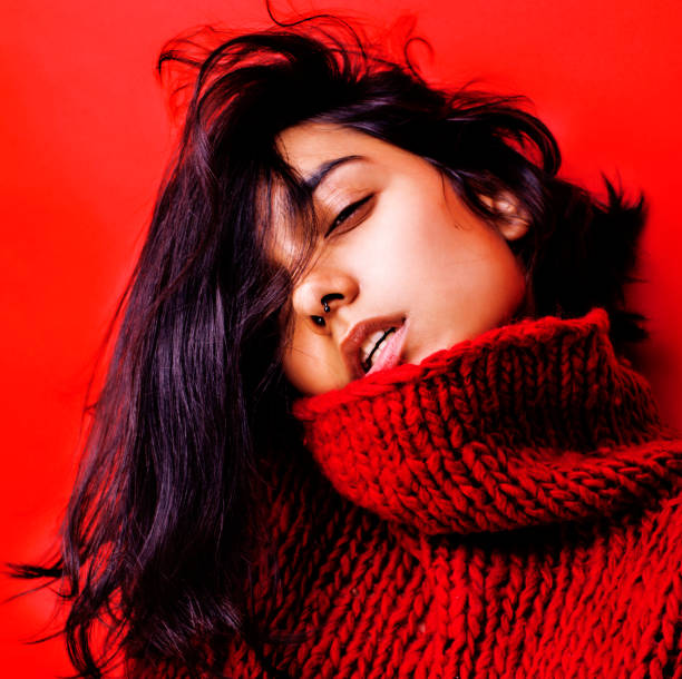 young pretty indian girl in red sweater posing emotional, fashion hipster teenage, lifestyle people concept young pretty indian girl in red sweater posing emotional, fashion hipster teenage, lifestyle people concept close up hot arabic girl stock pictures, royalty-free photos & images