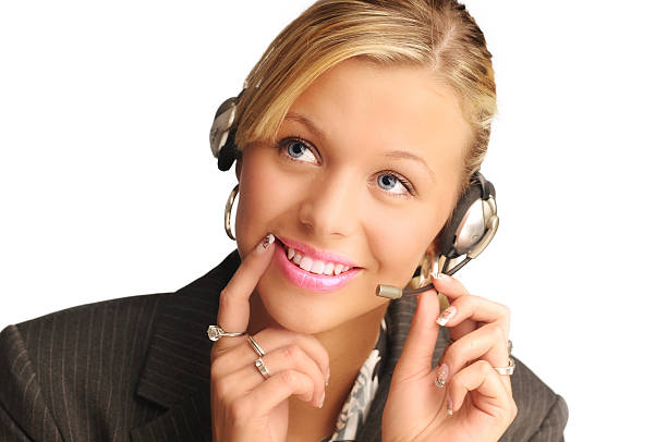 young pretty sexy blond hair operator with headset stock photo