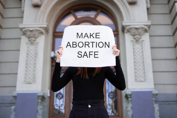 Young Protesters Pro-choice supporters protested in front of the courthouse against anti-abortion law. abortion protest stock pictures, royalty-free photos & images