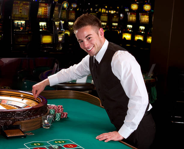 6,694 Casino Dealer Stock Photos, Pictures &amp; Royalty-Free Images - iStock