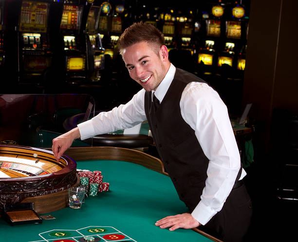 6 085 Casino Dealer Stock Photos Pictures Royalty Free Images Istock