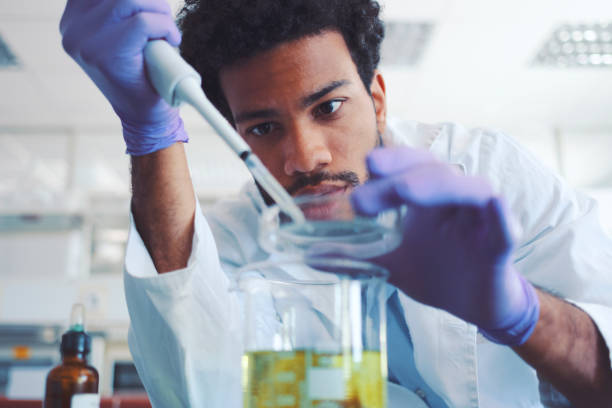 Young scientist working in laboratory.