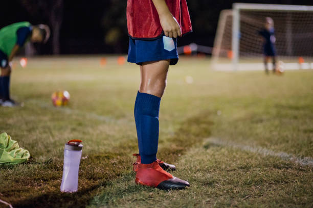 young soccer player - soccer night imagens e fotografias de stock