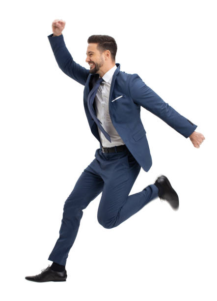Young successful manager jumping in the air isolated stock photo