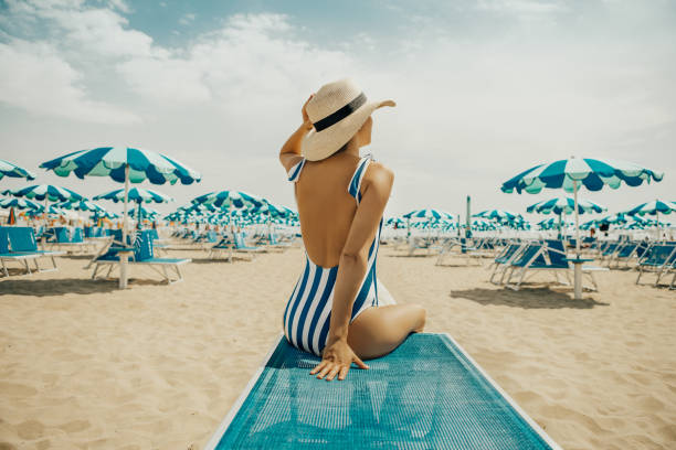Young woman at italian beach stock photo