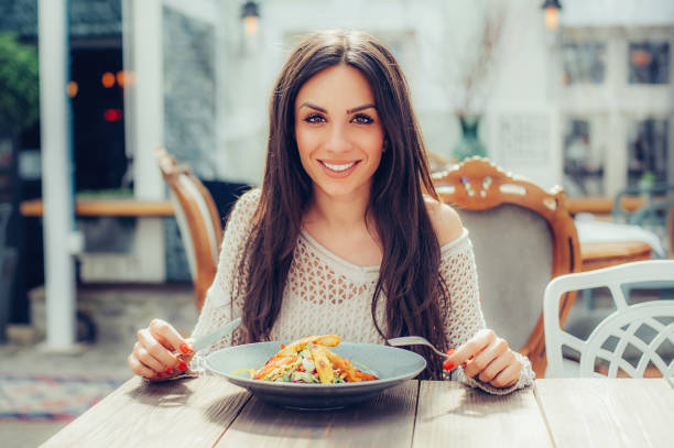 Best Lady Eating Rice Stock Photos, Pictures & Royalty-Free Images - iStock