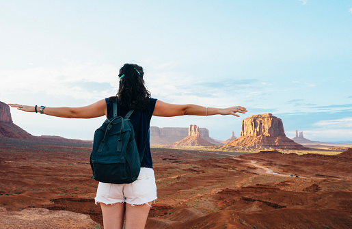 Young Woman Feels Free At Monument Valley