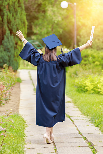 Young Woman In Graduation Day Celebrating Stock Photo - Download Image ...