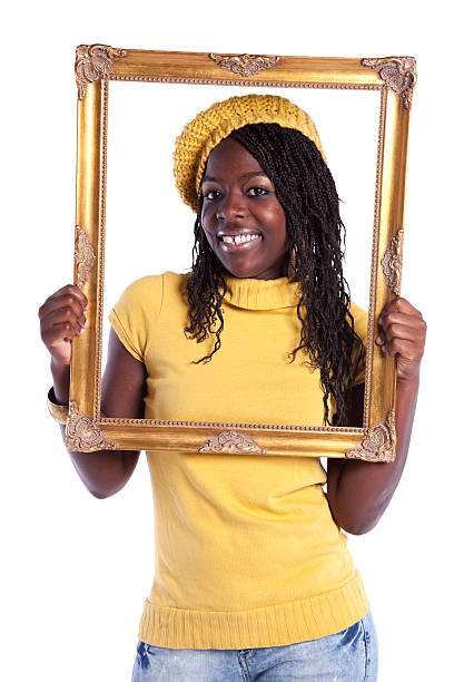 young woman inside a picture frame stock photo