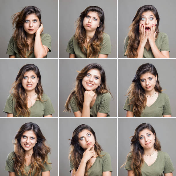 Young woman making facial expressions Young woman making facial expressions, studio portraits same person different outfits stock pictures, royalty-free photos & images