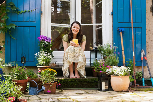 young woman on a patio stock photo