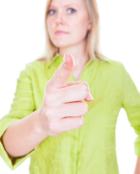 Young woman pointing her finger stock photo