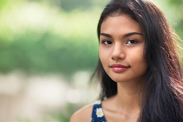 Young woman portrait Portrait of a young beautiful woman outdoors. philippine girl stock pictures, royalty-free photos & images