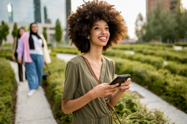 Young woman using mobile phone stock photo