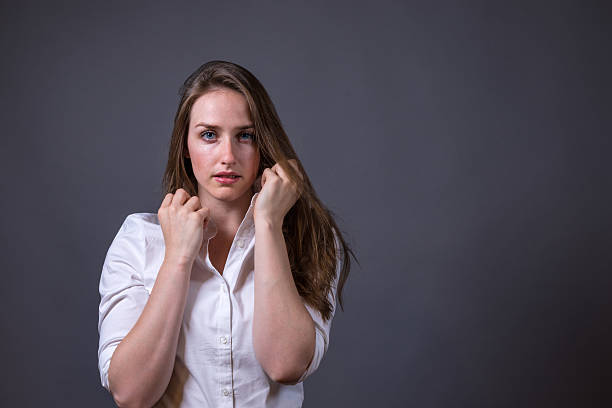 Young Woman Wearing White Button-up Shirt stock photo