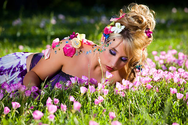 Young Woman with Flowers and Jewels stock photo