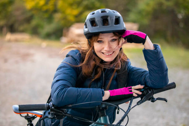Young woman with MTB bike stock photo