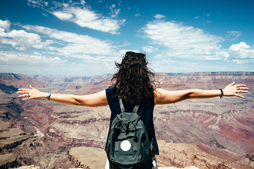 Young Woman With Open Arms At Grand Canyon