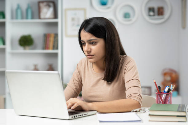 Young woman working at home, stock photo stock photo
