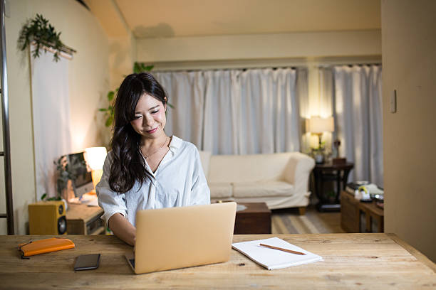 Young woman working from home stock photo