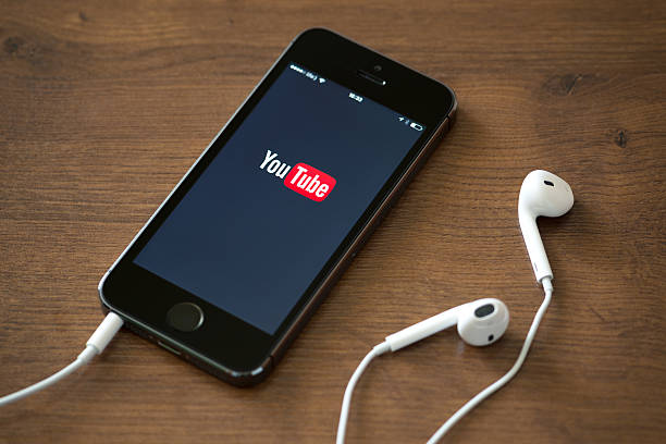 YouTube application on Apple iPhone 5S stock photo