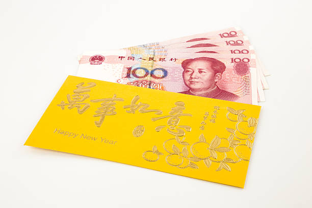 Yuan banknote and golden envelope money yuan cash banknote and gold envelope, celebrate chinese new year and asian culture quan yuan stock pictures, royalty-free photos & images