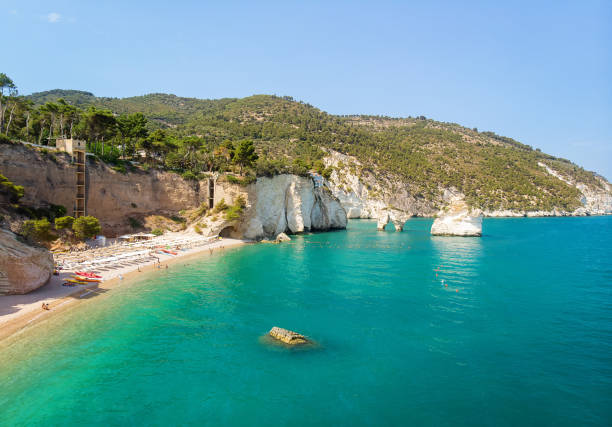 Zagare Beach Bay, Gargano and Faraglioni di Puglia stock photo