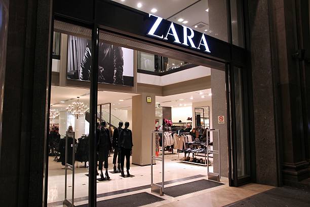 Zara Barcelona, Spain - November 5, 2012: People visit Zara store on November 5, 2012 in Barcelona, Spain. Zara has 1,763 stores and had more than 7 billion EUR revenue in 2009. brand name stock pictures, royalty-free photos & images