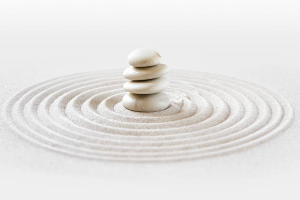 Zen japanese garden background White stones pile in the sand. Zen japanese garden background scene buddhism stock pictures, royalty-free photos & images
