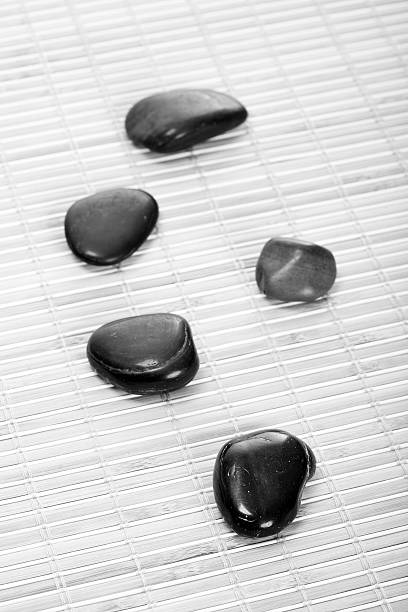 Zen-Stones on bamboomat, bw stock photo
