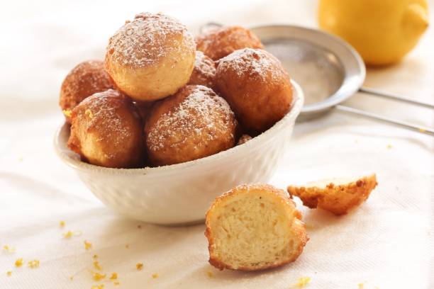 Zeppole - Italian Ricotta Donuts on white background, selective focus stock photo