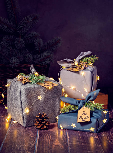 Zero Waste, eco-friendly, sustainable furoshki style wrapped Christmas Gifts. stock photo
