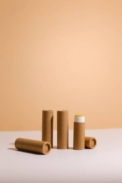 Zero Waste Lipstick packaging. Lip balm tube made of paper. Blank label mock up. Copy space for text Zero Waste Lipstick packaging. Lip balm tube made of paper. Blank label mock up. Copy space for text, modern concept cosmetic packaging stock pictures, royalty-free photos & images