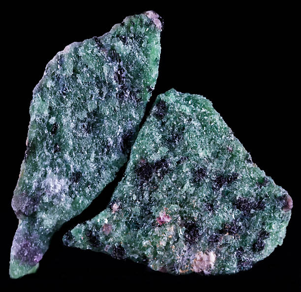 Zoisite Zoisite, first known as saualpite, after its type locality, is a calcium aluminium hydroxy sorosilicate belonging to the epidote group of minerals. zoisite stock pictures, royalty-free photos & images