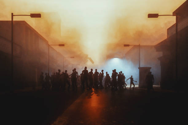 Zombie apocalypse in the city at night stock photo