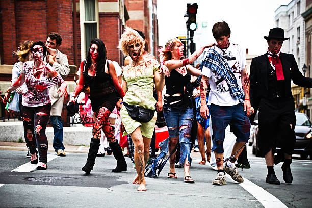 Zombie Walk participants crossing Halifax street stock photo