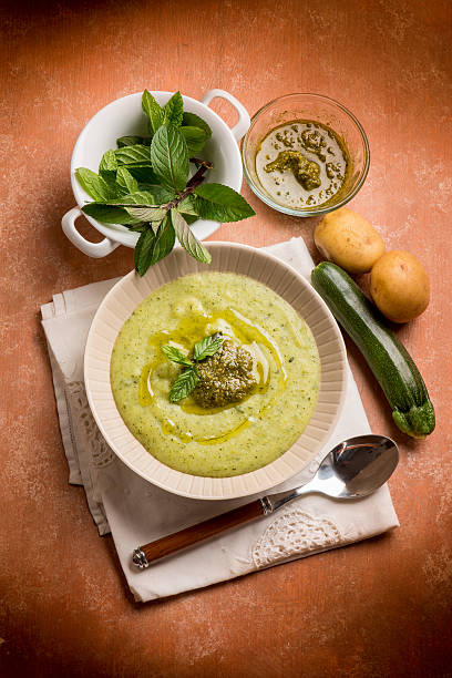 zucchinis soup with mint pesto stock photo
