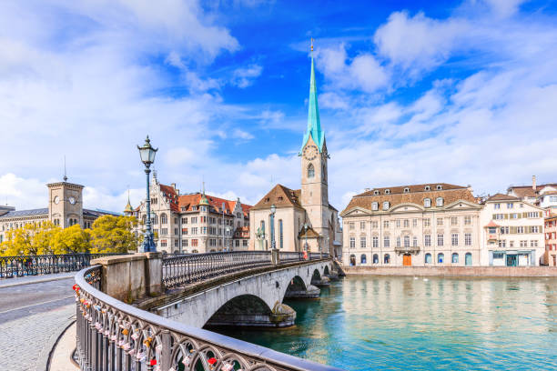 Zurich, Switzerland. Zurich, Switzerland. View of the historic city center with famous Fraumunster Church, on the Limmat river. zurich stock pictures, royalty-free photos & images