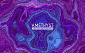 This vector illustration features abstract polygonal graphic art. It is a combination of triangular shapes in composition incorporating vibrant colors. The illustration represents the material of gemstone called amethyst. The image is purple and blue. The use of shine and color portrays a sense of hyper realistic shading and modern style of imagery.