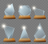 Realistic winner glass trophy first place. Clear glass trophy reward. Set of realistic isolated vector  glass signs. Championship to win the glass prize. Vector illustration