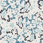 Abstract floral seamless pattern made of leaves, petals, buds, botanical elements. Trendy flat graphic. Meadow flowers. Illusion of wings of butterfly, bird or insect. Simple summer ornament.