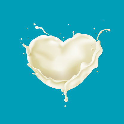 Abstract heart shaped milk splashes.
