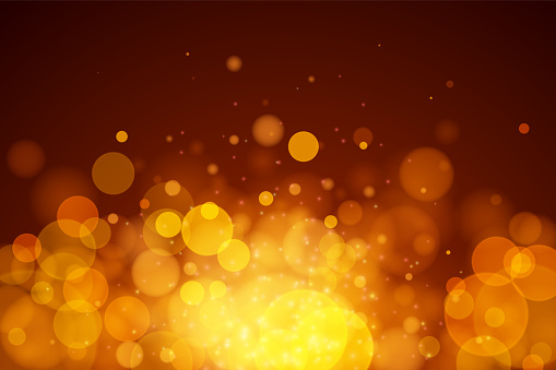 Abstract vector gold bokeh background.