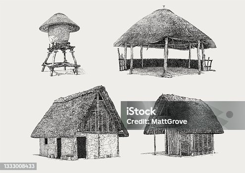 istock African Huts. Mud Houses. Water tower straw grass 1333008433