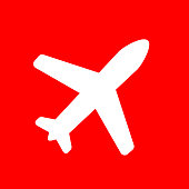 Airplane Flying Icon. The main icon is placed on a flat blue background. It takes up the center portion of the composition and is the main focus of this vector illustration. The icon is simple and the background further emphasizes the icon shape and makes it stand out. The illustration is a 100% royalty free vector.. The main icon is placed on a flat red background. It takes up the center portion of the composition and is the main focus of this vector illustration. The icon is simple and the background further emphasizes the icon shape and makes it stand out. The illustration is a 100% royalty free vector.