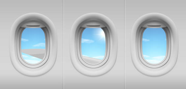Airplane portholes with sky and wing view Airplane windows. Vector realistic aircraft portholes with sky, clouds and wing view. Plane cabin interior in flight airplane borders stock illustrations