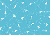 Airplane routes. Air travel. Air traffic silhouette. White airplanes isolated on blue background. Web site page and mobile app design element.