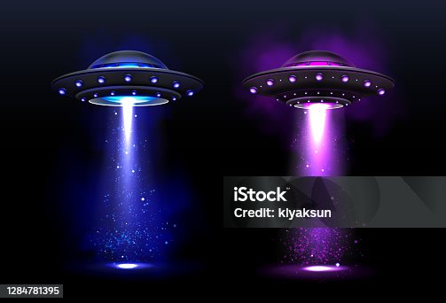 istock Alien spaceships, ufo with color light beam 1284781395